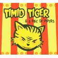 Timid Tiger And A Pile Of Pliers