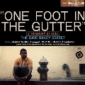 One Foot In The Gutter