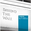 BEHIND THE WALL