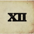 XII