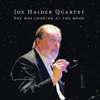 SHE WAS LOOKING AT THE MOON SHE WAS LOOKING AT THE MOON