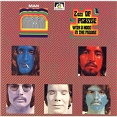 2oz Of Black Plastic With A Hole In The Middle